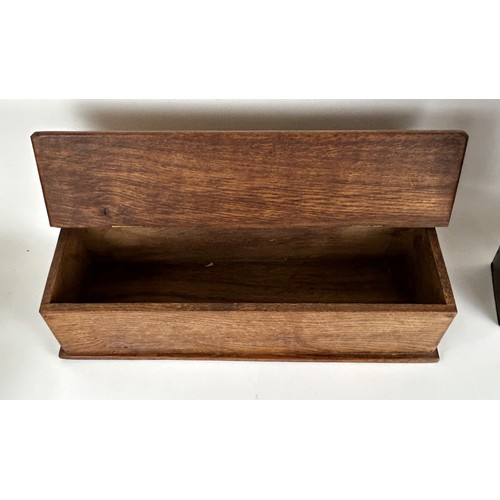 937 - An oak candle box, 45 cm high, another, two boxes and two silver teaspoons (6)