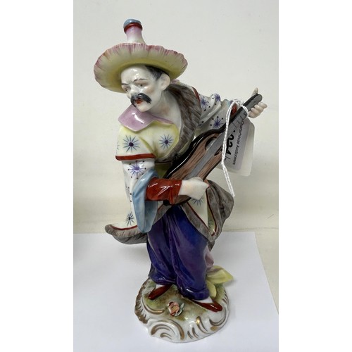 1034 - A pair of Dresden figures, of a man and a woman in Chinese dress, 20 cm high (2)