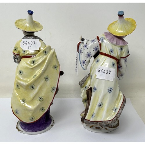 1034 - A pair of Dresden figures, of a man and a woman in Chinese dress, 20 cm high (2)