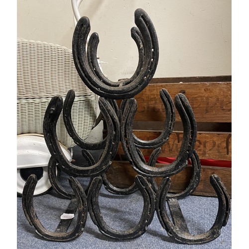 1003 - A cast iron animal trough, a wine holder in the form of horseshoes, a doll's pram and other items (q... 