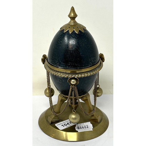 1047 - A late 19th century novelty inkstand, in the form of a brass mounted Emu egg, 23 cm high