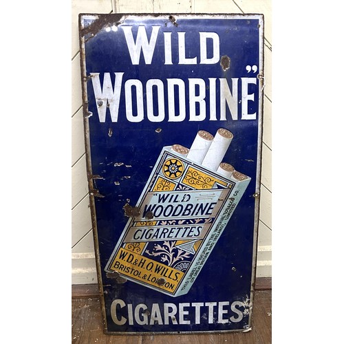 1068 - An enamel sign, Wild Woodbine Cigarettes, 95 x 46 cm