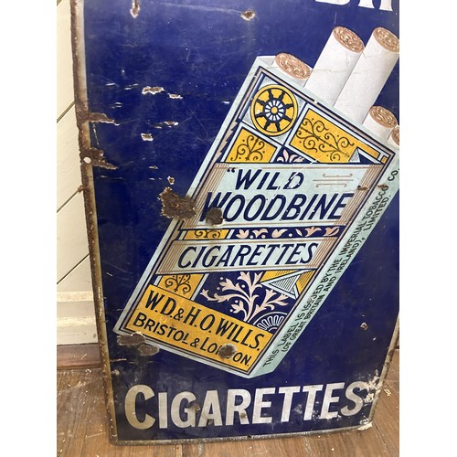 1068 - An enamel sign, Wild Woodbine Cigarettes, 95 x 46 cm