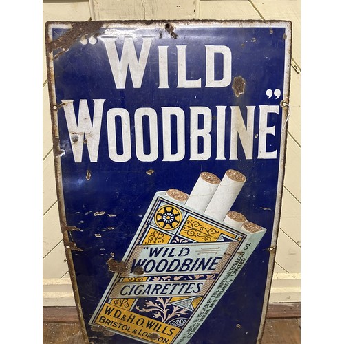 1068 - An enamel sign, Wild Woodbine Cigarettes, 95 x 46 cm