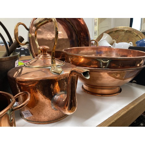 970 - A brass and copper preserve pan, assorted copper, and a set of graduated copper pans, with brass loo... 