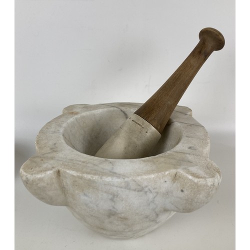 983 - A stoneware hot water bottle, 18 cm diameter, and a pestle and mortar (3)