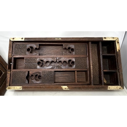 1048 - An Islamic carved wood and bone box, with a fitted interior, 50 cm wide