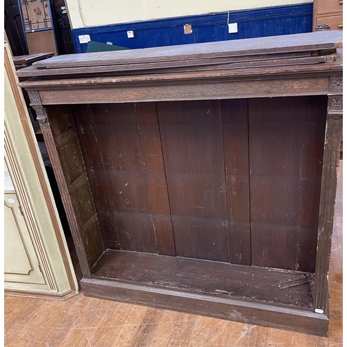 1194 - A mahogany corner cabinet, 82 cm wide, a painted corner cabinet, 69 cm wide, and a bookcase, 112 cm ... 