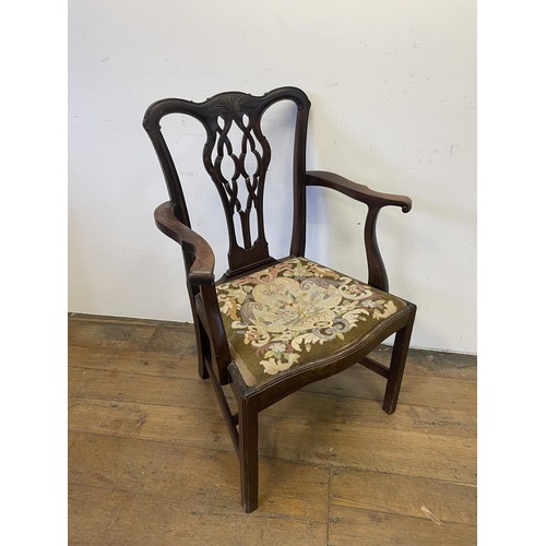 1159 - A Chippendale style mahogany armchair, and an oak sideboard (2)