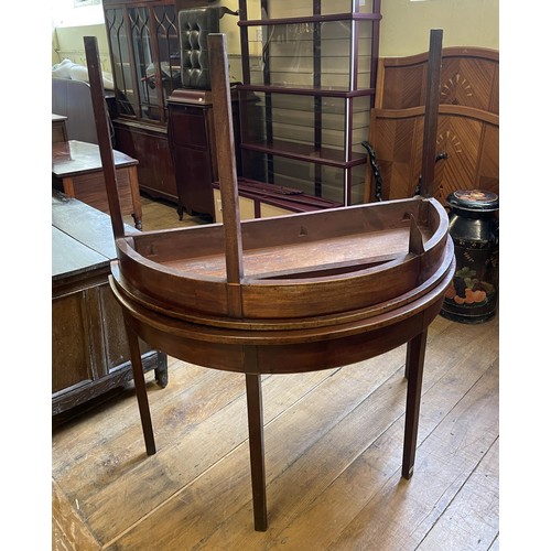 1125 - A mahogany sideboard, 92 cm wide, and two demi-lune table ends (3)