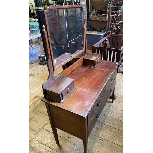 1121 - A mahogany armchair, a dressing chest, a drop leaf table, another, a wall clock, and a two tier tabl... 