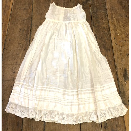 912 - A late 19th/early 20th century Christening gown, and another