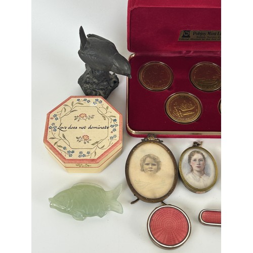 1040 - A gilt metal and enamel box, a set of coins and other items