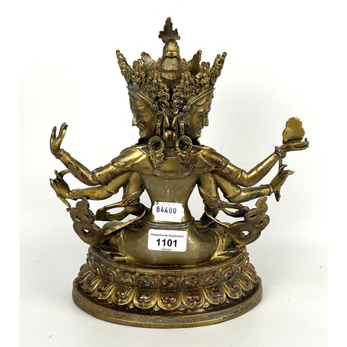 1101 - A gilt metal Buddha, 33 cm high