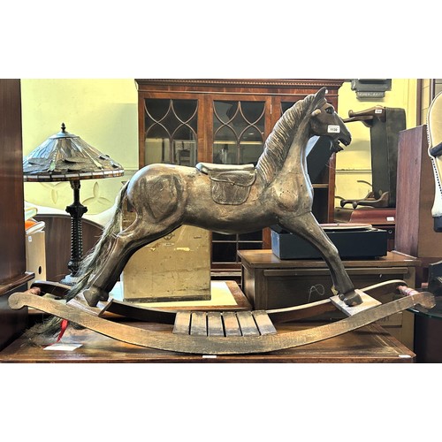 1130 - A rocking horse, 127 cm