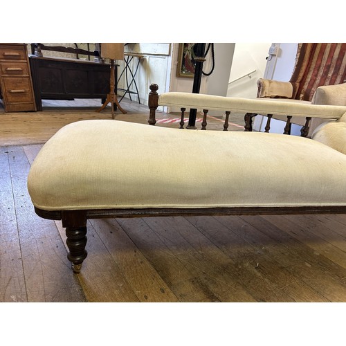 1144 - An oak framed chaise longue