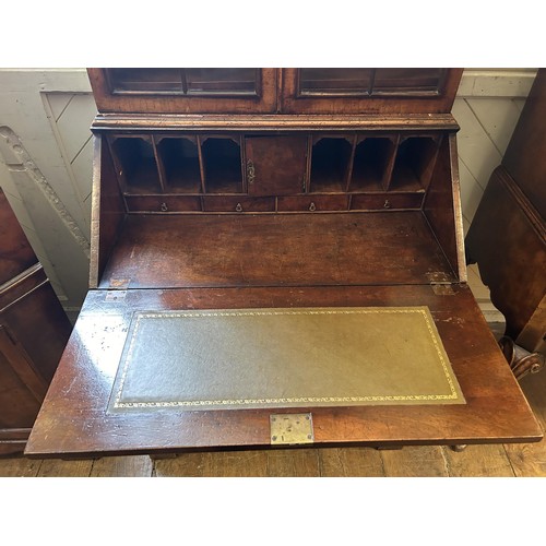 1178 - An 18th century style walnut bureau bookcase, 76 cm wide