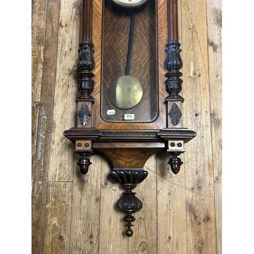 1136 - A Vienna regulator style wall clock, in a walnut case, 152 cm