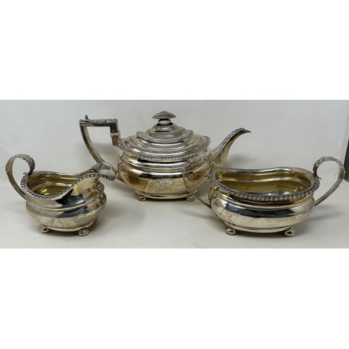 267A - An early 19th century silver three piece tea service, marks rubbed, 34.6 ozt (3)Ivory Exemption regi... 