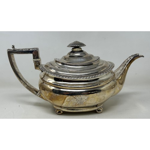 267A - An early 19th century silver three piece tea service, marks rubbed, 34.6 ozt (3)Ivory Exemption regi... 