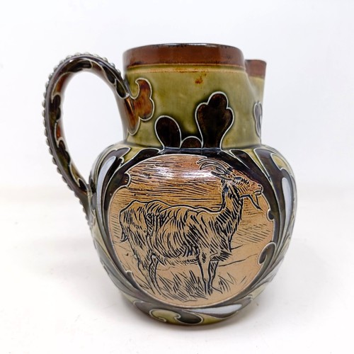 701 - A Doulton Lambeth jug, by Hannah Barlow, decorated goats, 17 cm high