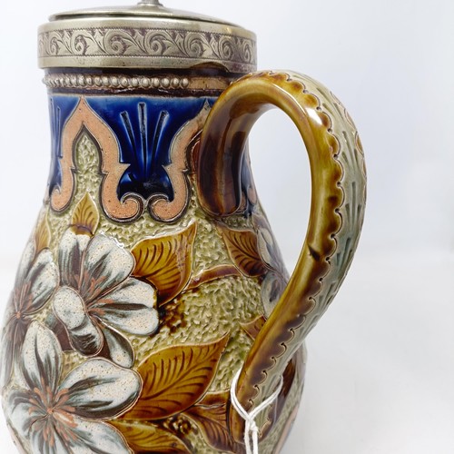 703 - A Doulton Lambeth jug, by Elizabeth M Small, decorated flowers, with a silver plated mount and lid, ... 