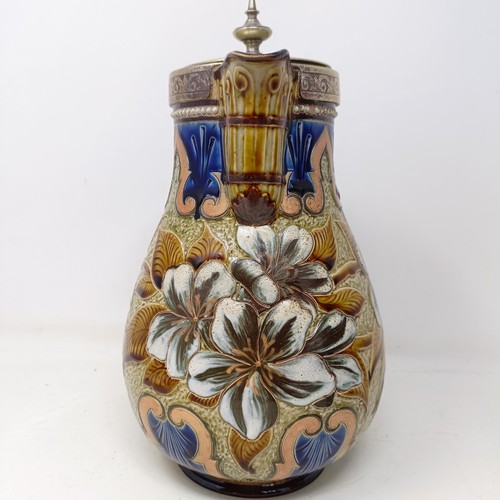 703 - A Doulton Lambeth jug, by Elizabeth M Small, decorated flowers, with a silver plated mount and lid, ... 