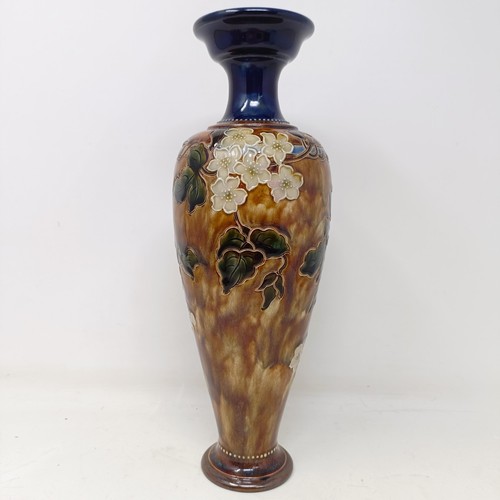 704 - A Royal Doulton vase, by Joan Honey, decorated flowers, 33 cm high