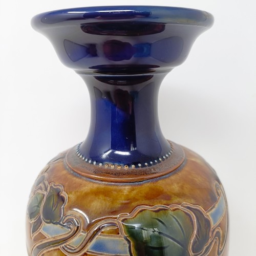 704 - A Royal Doulton vase, by Joan Honey, decorated flowers, 33 cm high