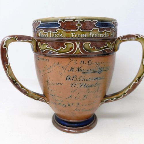 705 - A Royal Doulton three handled retirement loving cup, by Mark Marshall, with various signatures of th... 