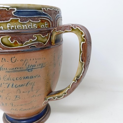 705 - A Royal Doulton three handled retirement loving cup, by Mark Marshall, with various signatures of th... 