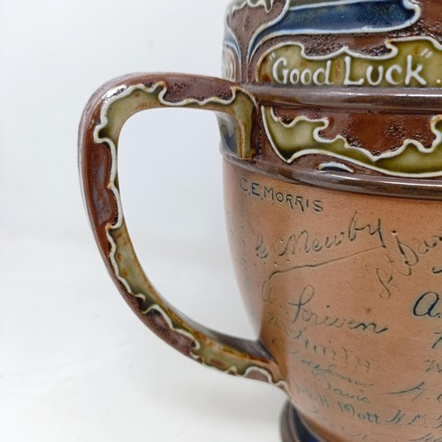 705 - A Royal Doulton three handled retirement loving cup, by Mark Marshall, with various signatures of th... 