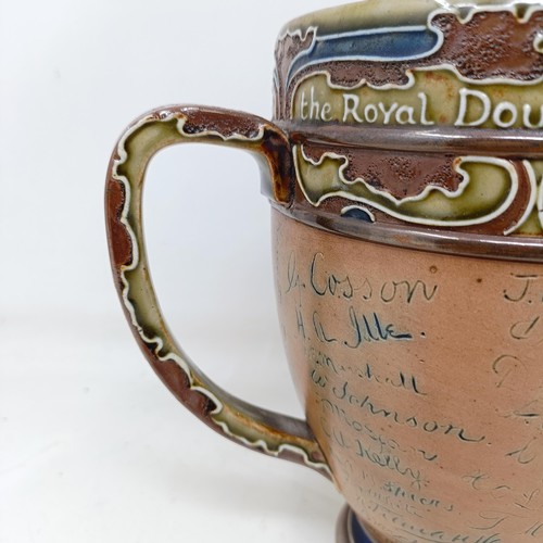 705 - A Royal Doulton three handled retirement loving cup, by Mark Marshall, with various signatures of th... 