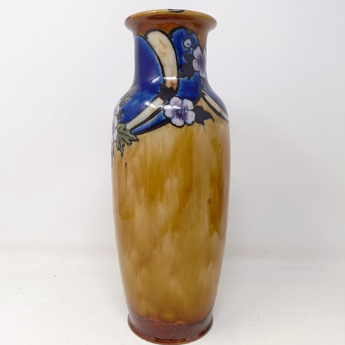 706 - A Royal Doulton vase, by Bessie Newberry, decorated flowers, 30 cm high