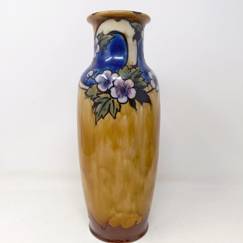 706 - A Royal Doulton vase, by Bessie Newberry, decorated flowers, 30 cm high