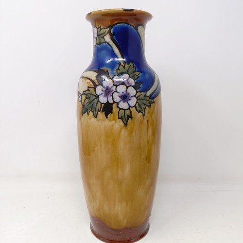 706 - A Royal Doulton vase, by Bessie Newberry, decorated flowers, 30 cm high