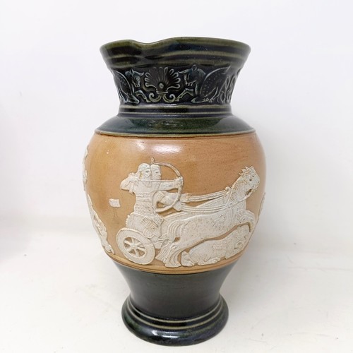 707 - A Doulton Lambeth jug, decorated in Egyptian manner, 20 cm