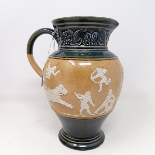 707 - A Doulton Lambeth jug, decorated in Egyptian manner, 20 cm