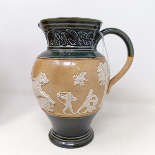 707 - A Doulton Lambeth jug, decorated in Egyptian manner, 20 cm