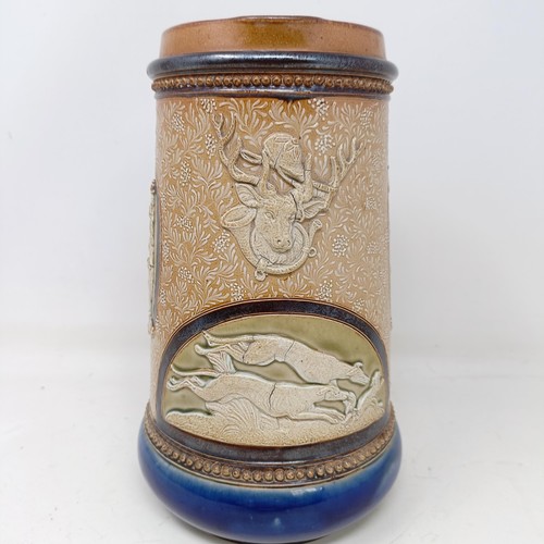 710 - A Doulton Lambeth jug, by Harriet Hibbut, decorated hunting scenes, 22 cm high