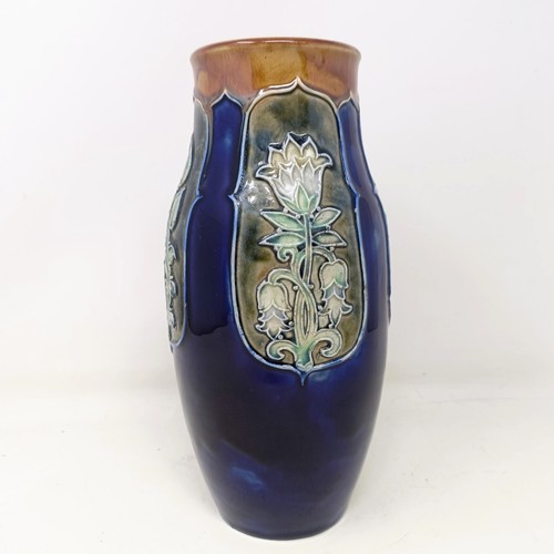 711 - A Royal Doulton vase, by Annie Neal and Eliza Stock, decorated flowers, 25 cm high