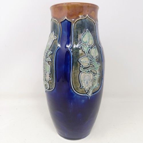 711 - A Royal Doulton vase, by Annie Neal and Eliza Stock, decorated flowers, 25 cm high