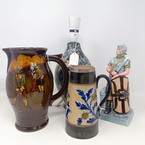 716 - A Royal Doulton jug, decorated golfers, 23 cm high, a Doulton Lambeth jug, decorated flowers, with a... 