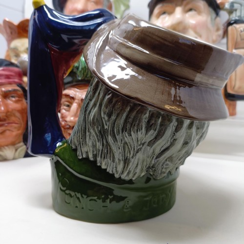 719 - A Royal Doulton character jug, Simon The Cellarer, Golfer D6623, Old King Cole, Izaak Walton, D6404,... 