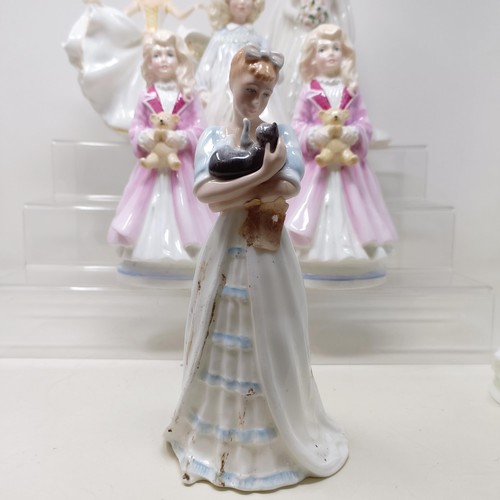 721 - A Royal Doulton figure, Bedtime Story HN2059, Delphine HN2136, Charity HN3087, Faith HN3082, Hope HN... 