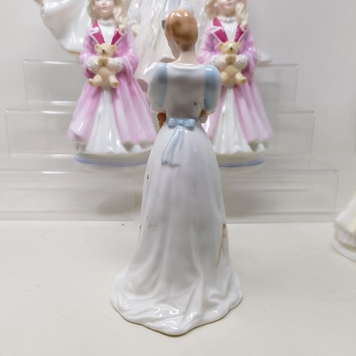 721 - A Royal Doulton figure, Bedtime Story HN2059, Delphine HN2136, Charity HN3087, Faith HN3082, Hope HN... 