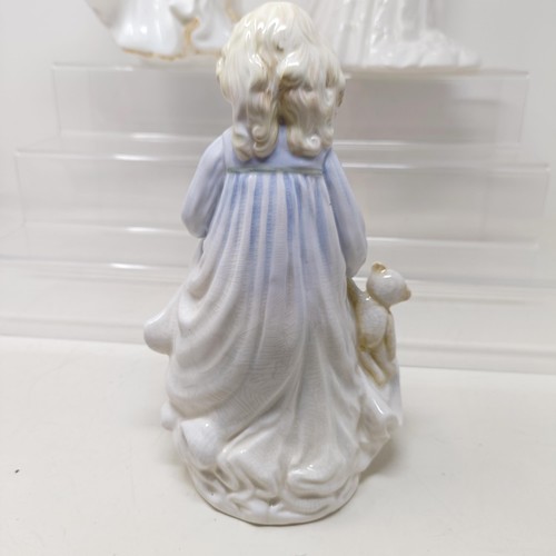 721 - A Royal Doulton figure, Bedtime Story HN2059, Delphine HN2136, Charity HN3087, Faith HN3082, Hope HN... 