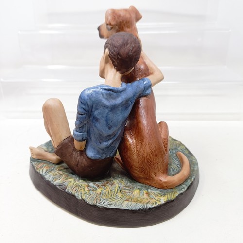 724 - A Royal Doulton figure of a Golden Eagle, RDA36, Buddies HN2546, a figure of a reclining dog, and as... 