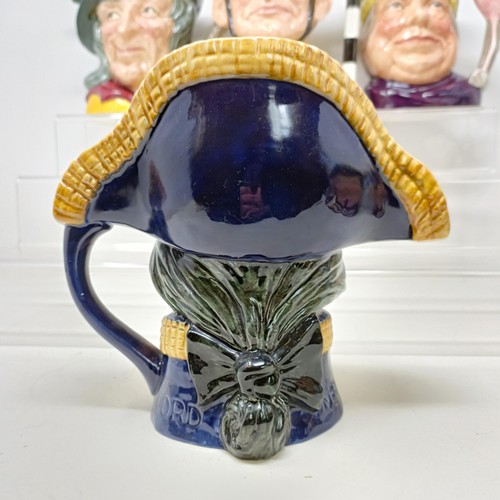 725 - A Royal Doulton character jug, The Falconer D6533, Beefeater D6206, Simon The Cellarer, Ugly Duchess... 