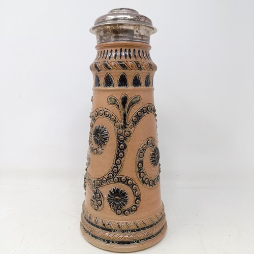 728 - A Doulton Lambeth stoneware flagon, with a silver mount, London 1866, 30 cm high